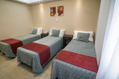 Standard Triple Room | In-room safe, desk, free WiFi, bed sheets