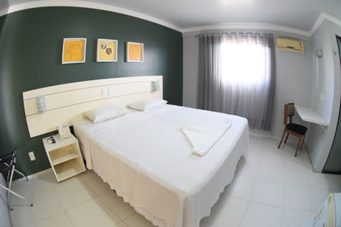 Standard Double Room | Minibar, in-room safe, individually decorated, individually furnished