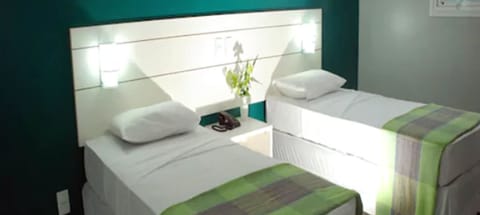 Standard Twin Room | Minibar, in-room safe, individually decorated, individually furnished