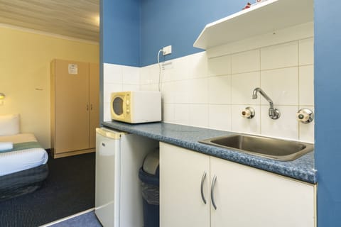 Poolside Family Suite | Minibar, desk, iron/ironing board, free WiFi