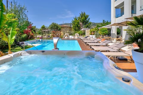 Outdoor pool, pool umbrellas, sun loungers