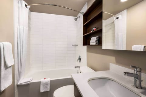 Room, 2 Queen Beds, Non Smoking (Shower/Tub Combo) | Bathroom | Hair dryer, towels, soap, shampoo