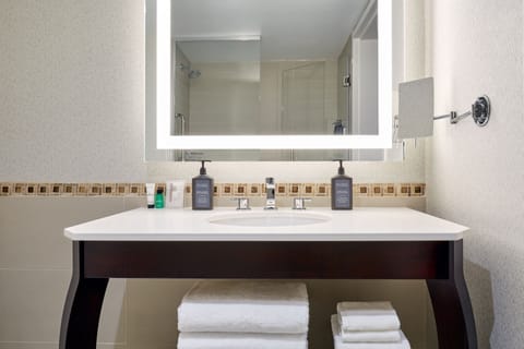 Shower, eco-friendly toiletries, hair dryer, towels