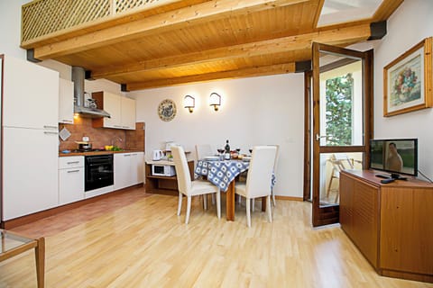 Family Apartment, Multiple Bedrooms (Appartamento Villa Lina) | Private kitchen | Full-size fridge, microwave, oven, stovetop