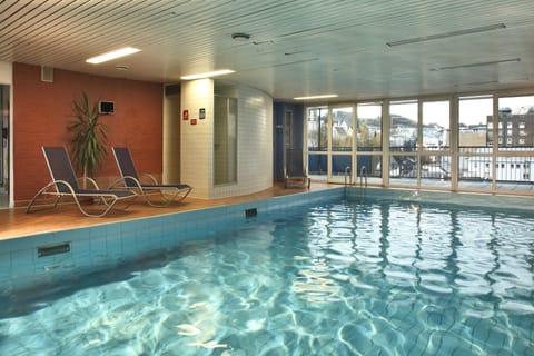 Indoor pool, open 7:00 AM to 10:00 PM, sun loungers