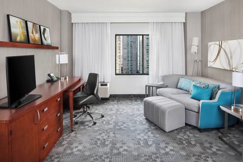 Suite, 1 Bedroom | Living room | 32-inch Smart TV with cable channels, TV, Netflix