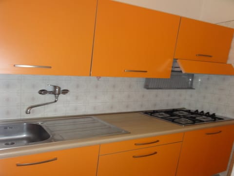 Apartment, 2 Bedrooms (B30027) | Private kitchen | Full-size fridge, microwave, stovetop, cookware/dishes/utensils