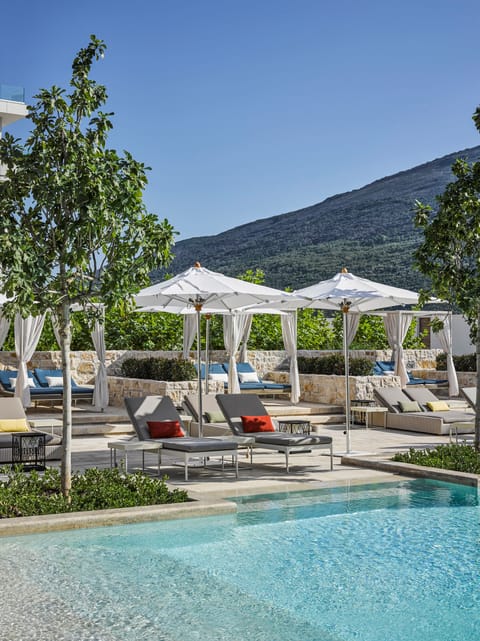 Seasonal outdoor pool, pool umbrellas, sun loungers