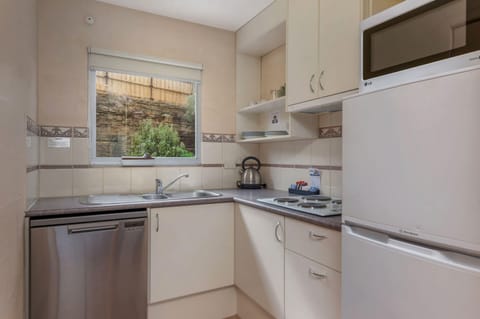 Standard Two Bedroom Apartment | Private kitchen | Fridge, microwave, oven, stovetop