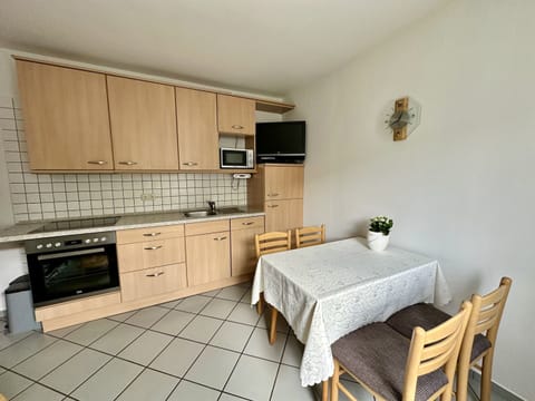 Apartment | Private kitchen | Microwave, dishwasher, coffee/tea maker, highchair