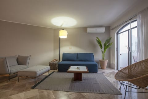 Suite, 2 Bedroom, 2 King Beds (CRETA) | Living room | 42-inch Smart TV with cable channels, TV