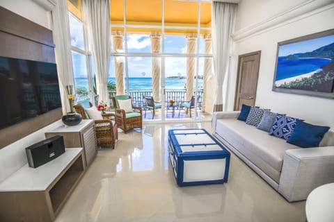 Premium Suite, 1 Bedroom, Oceanfront (Master) | Living area | 55-inch LED TV with cable channels, TV