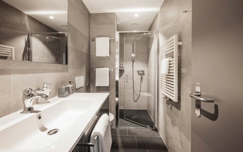 Premium bedding, down comforters, minibar, in-room safe