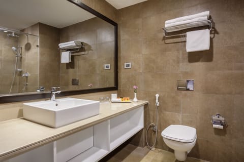 Deluxe Room, 1 Double Bed | Bathroom | Hair dryer, slippers, towels