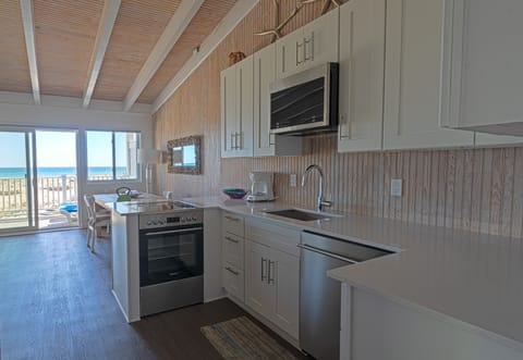 Lower One Bedroom Oceanfron (SR) | Private kitchen | Full-size fridge, microwave, stovetop, cookware/dishes/utensils