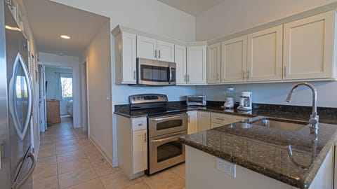 Lower 1 bedroom Ocean View ST | Private kitchen | Full-size fridge, microwave, stovetop, cookware/dishes/utensils