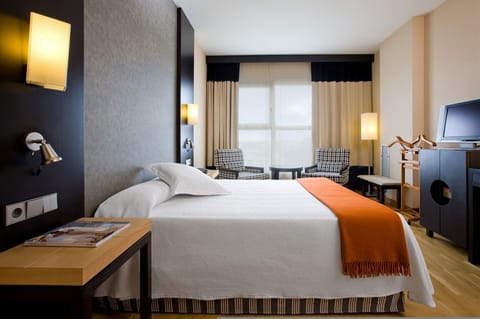 Premium bedding, minibar, in-room safe, desk