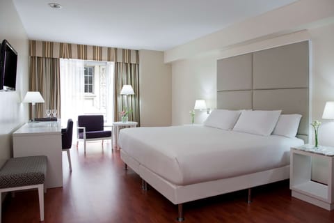 Premium bedding, down comforters, pillowtop beds, minibar