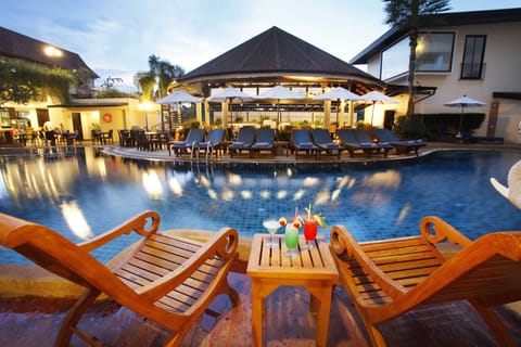 Outdoor pool, pool umbrellas, sun loungers