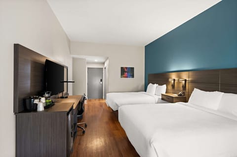 Standard Room, 2 Queen Beds, Non Smoking | Pillowtop beds, desk, laptop workspace, iron/ironing board