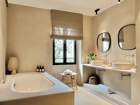 Junior House, 1 King Bed, Terrace, Garden View | Bathroom | Separate tub and shower, rainfall showerhead, eco-friendly toiletries