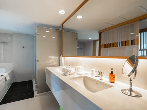 Glow Suite | Bathroom | Free toiletries, hair dryer, bathrobes, slippers