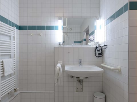 Shower, eco-friendly toiletries, hair dryer, towels