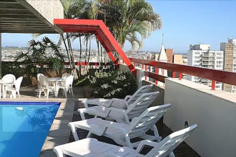 Outdoor pool, open 6:00 AM to 10:00 PM, sun loungers