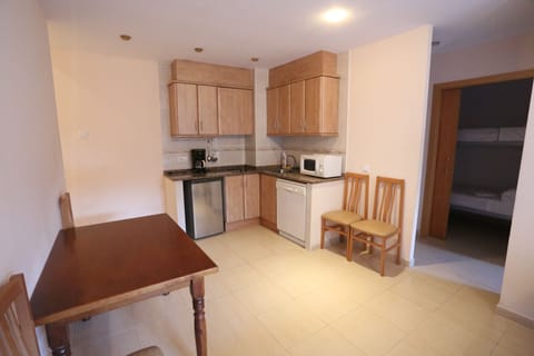 Apartment, 1 Bedroom | Private kitchen | Fridge, microwave, stovetop, dishwasher