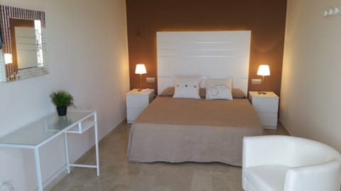 Quadruple Room, 2 Bedrooms, Connecting Rooms, Sea View | In-room safe, desk, free WiFi, bed sheets