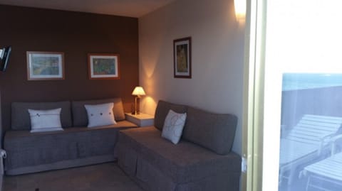 Quadruple Room, 2 Bedrooms, Connecting Rooms, Sea View | In-room safe, desk, free WiFi, bed sheets