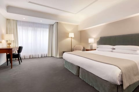 Executive Room | Premium bedding, minibar, in-room safe, desk