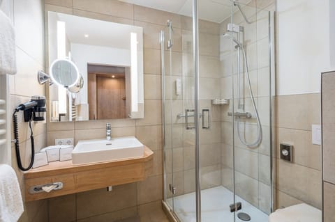 Hair dryer, towels, soap, shampoo