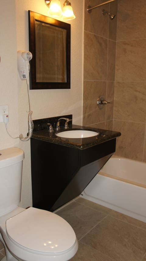 Executive Single Room | Bathroom | Hair dryer, towels, soap, shampoo