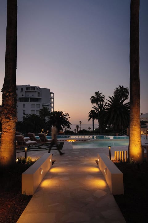 Outdoor pool, pool umbrellas, sun loungers