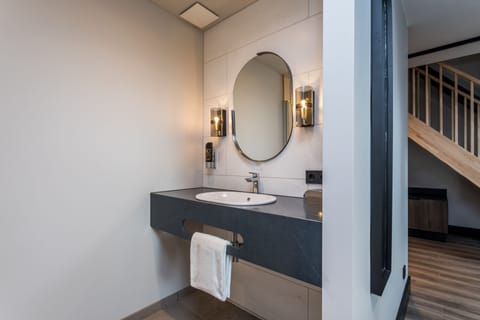 Junior Double Room | Bathroom | Rainfall showerhead, designer toiletries, hair dryer, towels