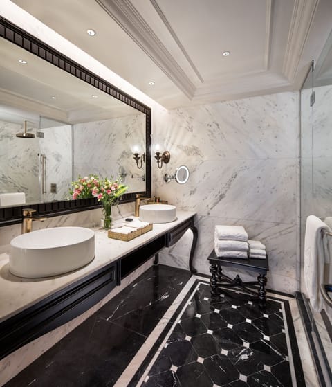 Presidential Suite | Bathroom | Designer toiletries, hair dryer, bathrobes, slippers