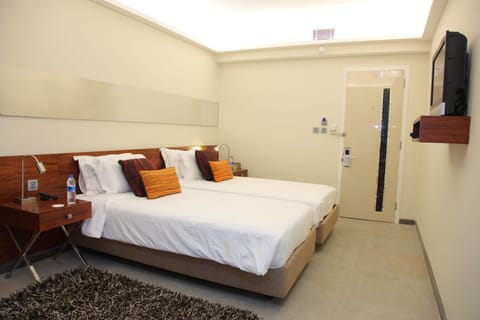 Deluxe Room | Premium bedding, in-room safe, individually decorated