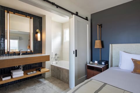 Designer toiletries, hair dryer, bathrobes, slippers