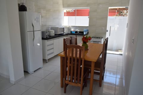 Apartment (Lua Minguante) | Private kitchen | Fridge, microwave, oven, highchair