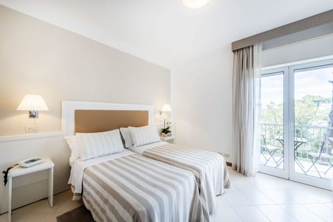 Standard Double or Twin Room | In-room safe, desk, free WiFi, bed sheets