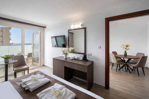 Suite, Sea View | Minibar, iron/ironing board, free WiFi, bed sheets