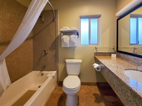 Desk, laptop workspace, blackout drapes, iron/ironing board