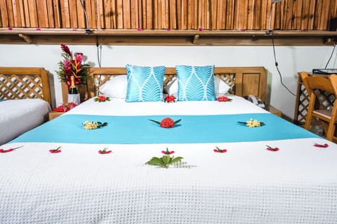 Cottage, Patio, Pool View | In-room safe, desk, iron/ironing board, free WiFi