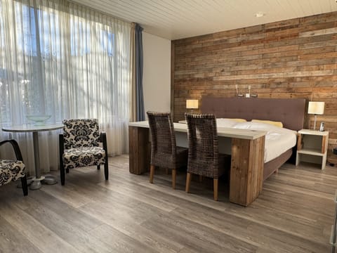 Studio, Ground Floor | Minibar, in-room safe, blackout drapes, iron/ironing board