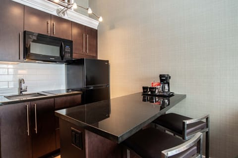 Suite, 1 King Bed with Sofa bed, Kitchen (Loft) | Private kitchenette | Mini-fridge, microwave, coffee/tea maker