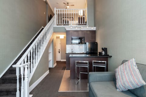 Suite, 1 King Bed with Sofa bed, Kitchen (Loft) | Living area | Flat-screen TV, pay movies