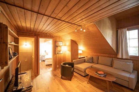 Romantic Condo | Living area | Flat-screen TV, DVD player