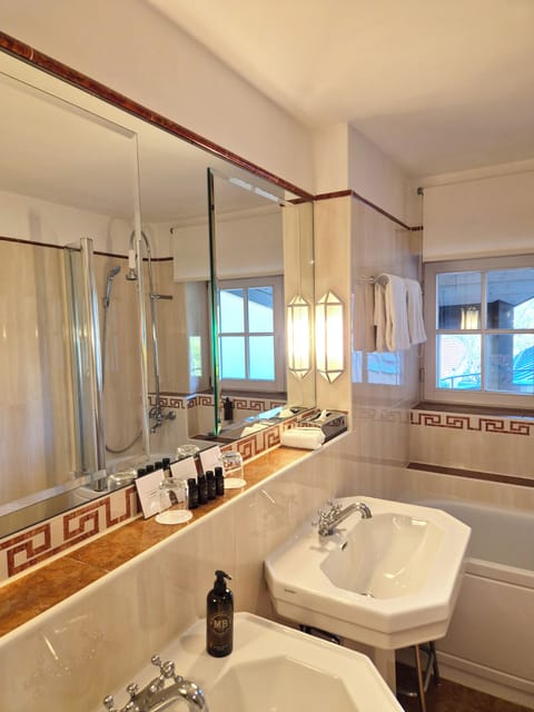 Suite, Balcony, Mountain View | Bathroom | Free toiletries, hair dryer, bathrobes, slippers