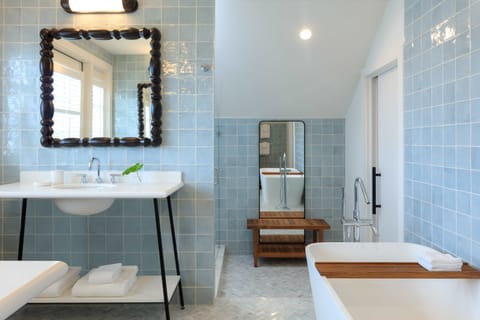 Designer toiletries, hair dryer, bathrobes, towels